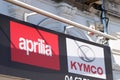 Aprilia and Kymco store scooter manufacturer logo brand and text sign shop worldwide