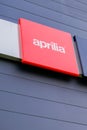 aprilia logo sign and text front of motorcycle dealership italian motorbike scooter