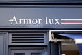 Armor Lux sign logo store text brand french fashion shop wall facade pleasure sea