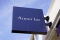 Armor Lux sign text and brand logo on wall boutique fashion shop marine sea ocean