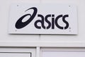 Asics logo brand and text sign of Japanese multinational corporation shoes athletic Royalty Free Stock Photo