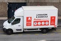 Auchan market logo sign supermarket on delivery van to deliver sall at home Royalty Free Stock Photo