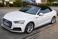 Audi A5 modern white new convertible car parked in french street Royalty Free Stock Photo