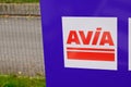 Avia logo brand and text sign of gas Station in border road