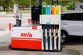 Avia sign logo and text on car pump gas station filling mineral oil brand in Europe