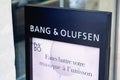 Bang & Olufsen logo brand and text sign on advertising facade shop entrance of Danish