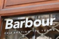 Barbour Logo and text sign front of shop fashion retailer classic clothing Royalty Free Stock Photo