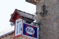 1664 beer brand logo and sign text on wall pub restaurant facade