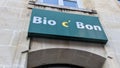 Bio c` Bon logo and text sign front of fresh bio grocery store for distribution of