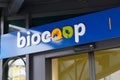Biocoop logo sign and brand text on entrance facade bio store market