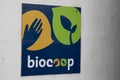 Biocoop logo sign and brand text on shop chain wall entrance facade bio store