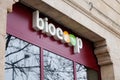 Biocoop logo sign and brand text on wall entrance facade bio store market