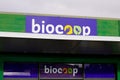 Biocoop logo sign and brand text on wall facade entrance bio store market