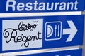 Bistro regent French Bar restaurant sign text and logo brand arrow panel signroad Royalty Free Stock Photo