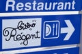 Bistro regent French Bar restaurant sign text and logo brand arrow panel signroad