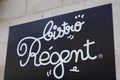 Bistro regent French Bar restaurant sign text and logo on building wall Royalty Free Stock Photo