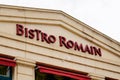 Bistro romain text sign and logo brand front of wall restaurant french chain building