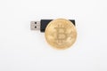 Bitcoin golden coin with usb flash drive Crypto currency coins on white background BTC Royalty Free Stock Photo