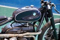BMW logo brand and text sign on ancient black motorcycle detail of retro classic