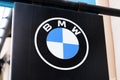 BMW logo round text blue white and brand sign of car dealership store automakers german Royalty Free Stock Photo