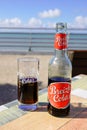Breizh Cola bottle and glasses with logo local soft drink brand bottled from Brittany