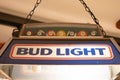 bud light brand logo and text sign on light billiards of American Budweiser beer