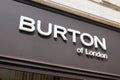 Burton of london sign text and logo on store front of entrance fashion clothing shop