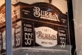 Burton of london vintage ancient sign text facade logo brand on store front of british