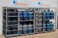 Butagaz logo sign and text brand on steel cage for presentation and sale of butane and