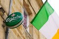 Carlsberg beer irish flag sign text and brand logo on facade wall building bar pub