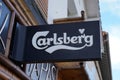 Carlsberg beer sign text and brand logo on facade wall building bar pub restaurant