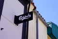 Carlsberg text brand and sign logo wall facade of beer bar restaurant in french street