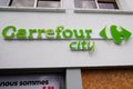 Carrefour city logo green and text sign brand supermarket store shop in town center