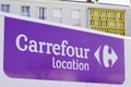 Carrefour location logo brand and text sign on panel van rental trucks city