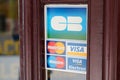 CB mastercard visa maestro electron pay sign text and brand logo door facade shop
