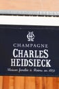 Charles Heidsieck logo and text sign on restaurant bar entrance of french Champagne