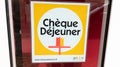 Cheque dejeuner logo brand and text sign label on french windows restaurant