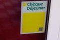 Cheque dejeuner logo brand yellow and text sign on windows restaurant