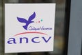 cheque vacances ancv logo brand and text sign of acceptance voucher on facade entrance