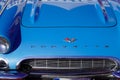 Chevrolet Corvette emblem sign and logo text brand on vintage fifties blue front