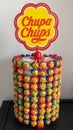 Chupa Chups logo text and Spanish brand sign on candy lollipop display in the