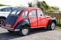 Citroen 2CV black red charleston retro vintage french historical old car ancient Royalty Free Stock Photo