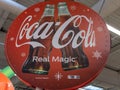 Coca Cola real magic christmas coke sign logo and brand text advertising drink bar