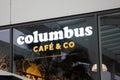 Columbus Cafe & Co brand logo and text sign facade windows of French coffee and
