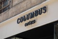 Columbus Cafe & Co sign brand and text logo on entrance restaurant facade bar French