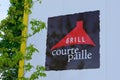 Courtepaille grill brand text and sign logo on restaurant facade wall