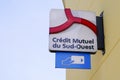 Credit mutuel du sud ouest sign text and logo brand on bank southwest office agency Royalty Free Stock Photo