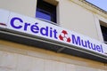 Credit mutuel french sign bank logo and brand text on wall office signage agency Royalty Free Stock Photo