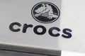 Crocs text sign and logo brand of shoe American company store manufactured foam clog