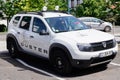 Dacia Duster car SUV white limited model edition with adventure text and sign logo on